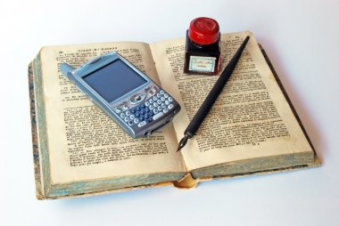 Cell phone, ink and old book clipart
