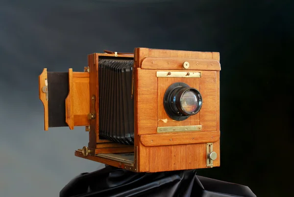 Old wooden photo camera