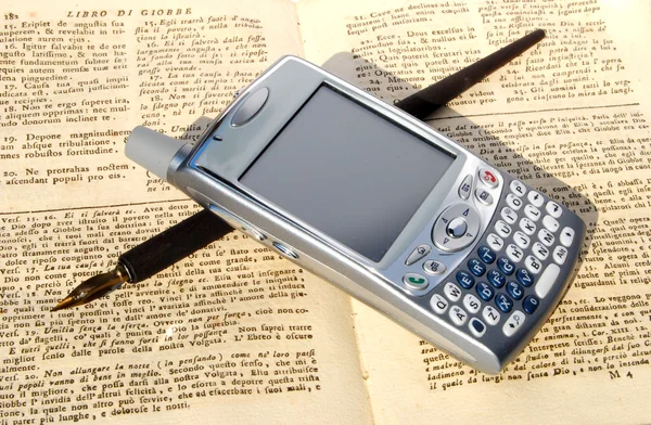 Cell phone, pen and old book — Stock Photo, Image