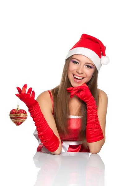 赤い帽子にサンタのクリスマスの女の子 — ストック写真