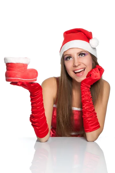 Weihnachtsmädchen mit rotem Weihnachtsmann-Hut — Stockfoto