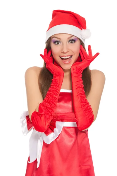 Kerstmis meisje in rode kerstmuts — Stockfoto