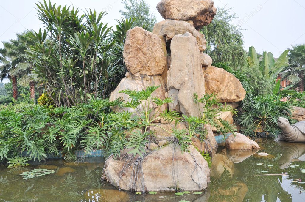 Chinese granite rockery in pond