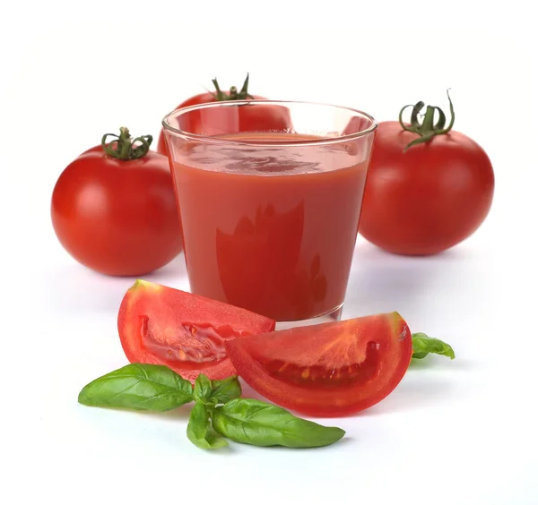 Sklenka rajčatové šťávy a ovoce — Stock fotografie