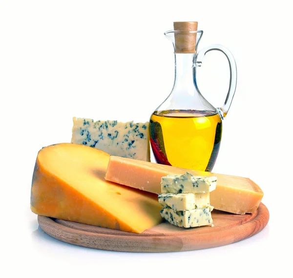 Collection of cheeses and olive oil — Stock Photo, Image