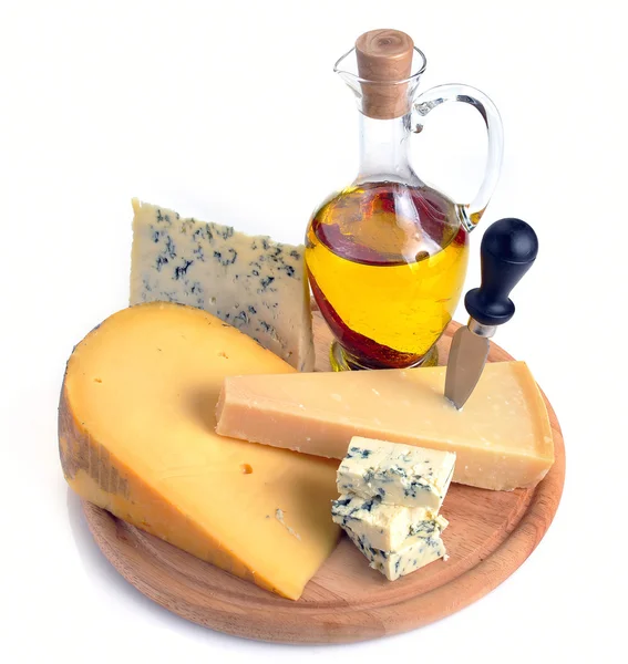 Collection of cheeses and olive oil — Stock Photo, Image