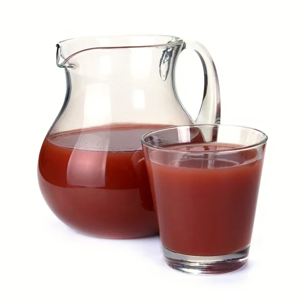 Plommon juice i en kruka och ett glas — Stockfoto