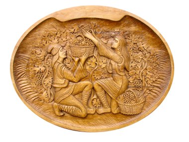 Gather grapes scene on a wooden bass-relief isolated clipart