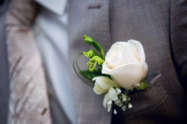 Boutonniere on a man's jacket clipart