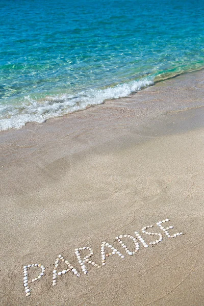Paradies in den Sand geschrieben — Stockfoto