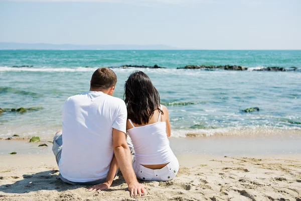 Par på stranden Stockbild