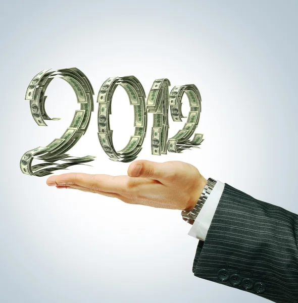 2012 sign on businessman's hand — Stock Photo, Image