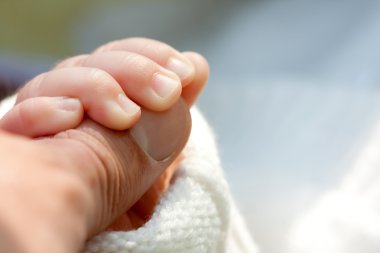 Little child holding father's hand clipart