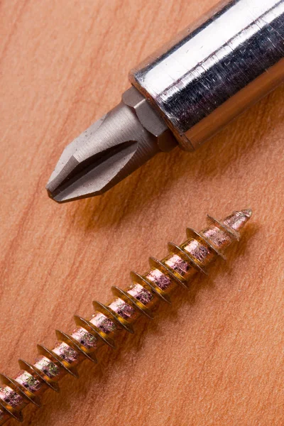Screwdriver and screw — Stock Photo, Image