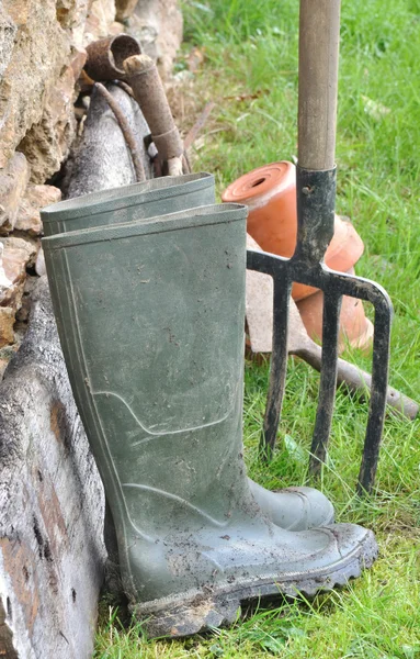 Boots of a gardener — Stock Photo, Image