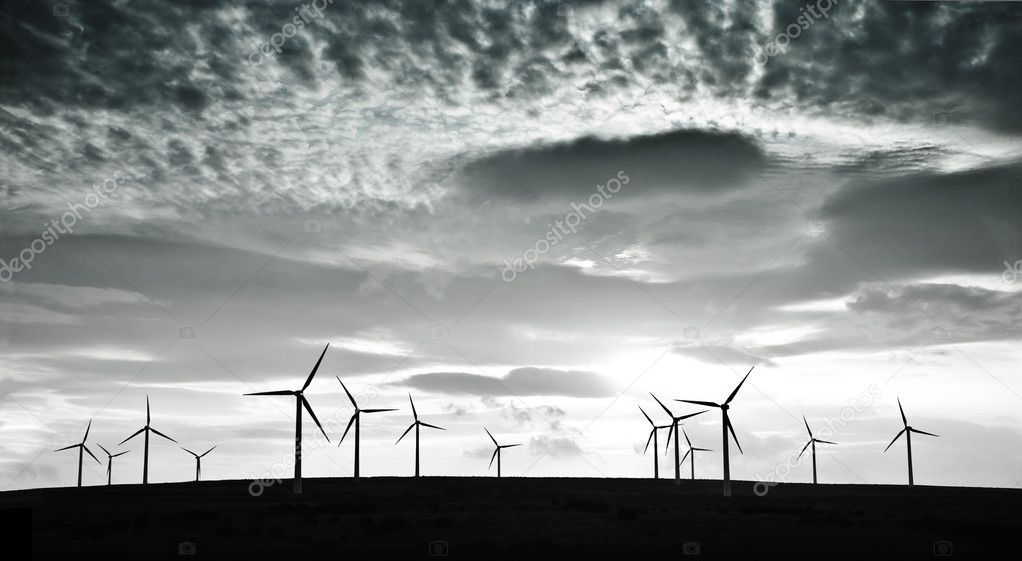 Wind turbines against dramatic clouds