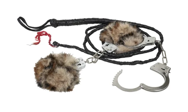 Whip and Fur-Lined Handcuffs — Stock Photo, Image