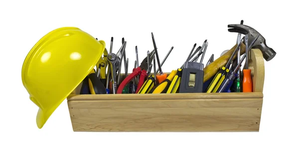 安全帽和木制长工具箱 — 图库照片