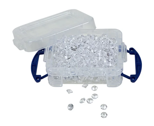 Diamantes em uma caixa de plástico — Fotografia de Stock