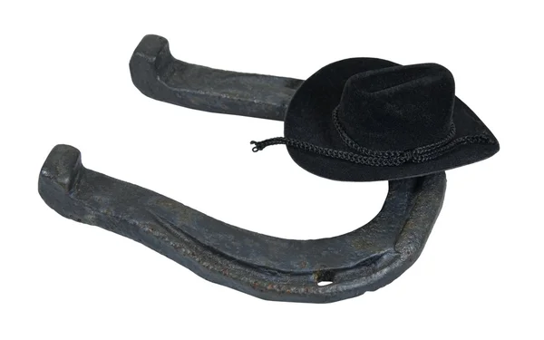 Sombrero de vaquero negro en una herradura —  Fotos de Stock