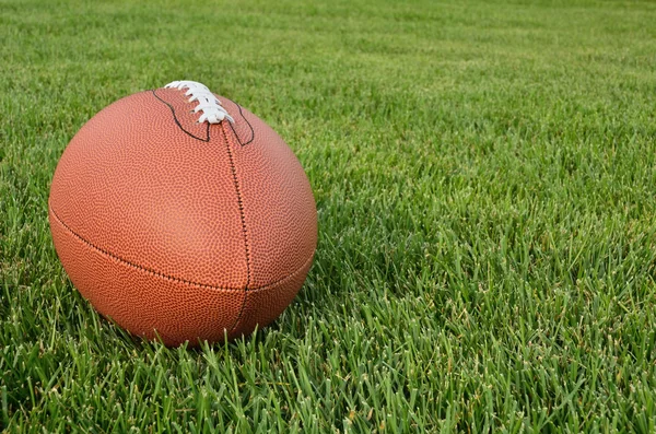 American Football on Grass Field — Stock Photo, Image