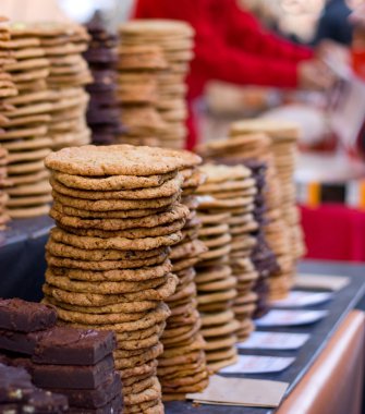 Cookies on a counter at a bakery.