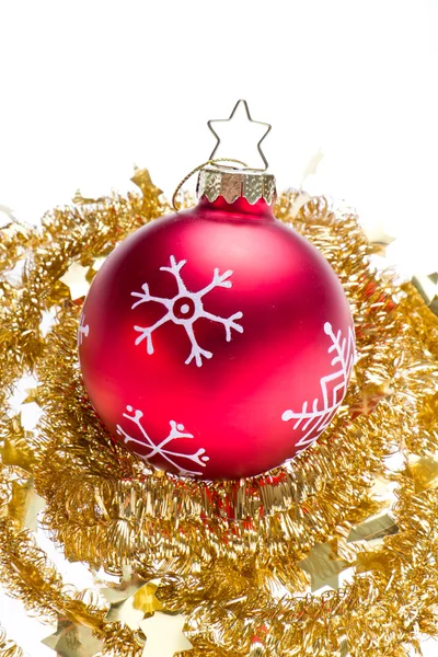 Christmas ball with snowflake symbols and tinsel — Stock Photo, Image