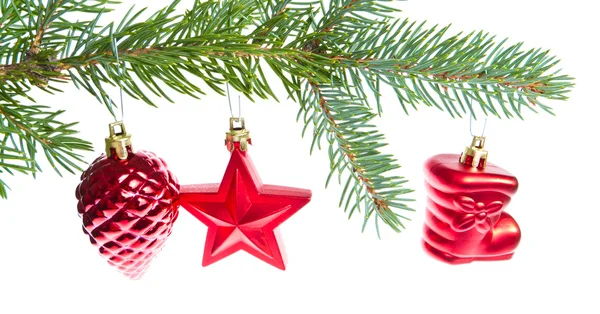 Red christmas decoration on the tree — Stock Photo, Image