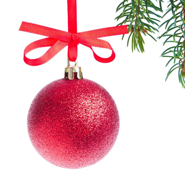 Red christmas ball hanging from tree — Stock Photo, Image