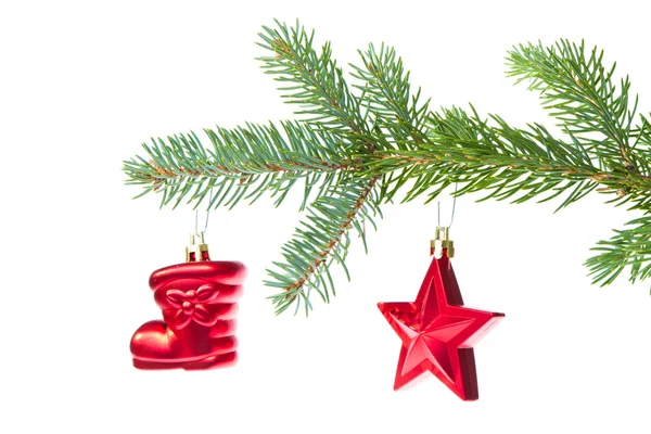 Red christmas decoration on the tree — Stock Photo, Image