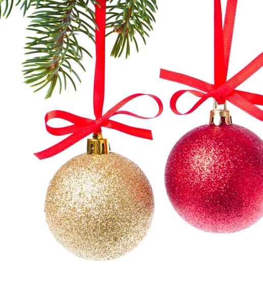 Christmas balls hanging from tree Stock Photo