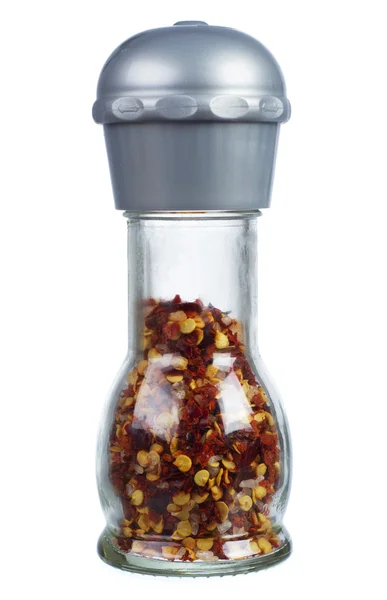 Červené chili pepper ve skleněné nádobě — Stock fotografie
