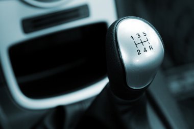 Gear shift handle in a modern car clipart