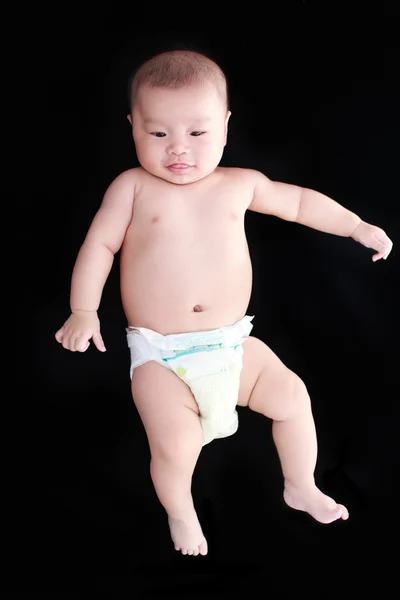 Schattige baby met zwarte achtergrond — Stockfoto
