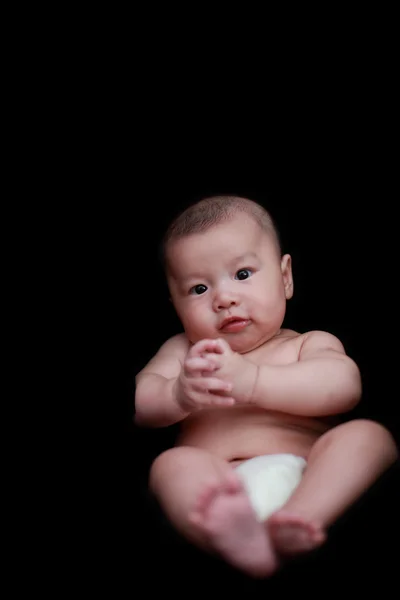 Bayi manis dengan latar belakang hitam — Stok Foto