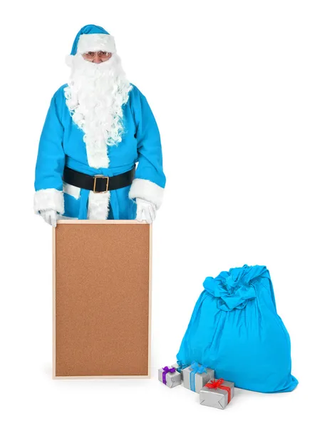 Niebieski Mikołaj pokazuje pusta tablica ogłoszeń — Zdjęcie stockowe