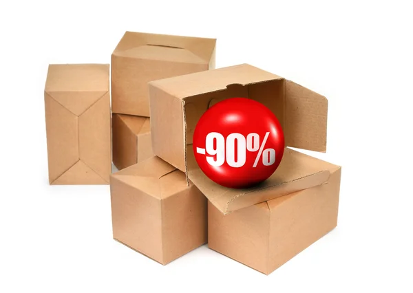 Sale concept - cardboard boxes and 3D sale ball — Stock Photo, Image