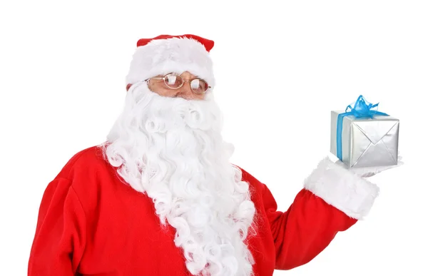 Santa holding presente — Foto de Stock
