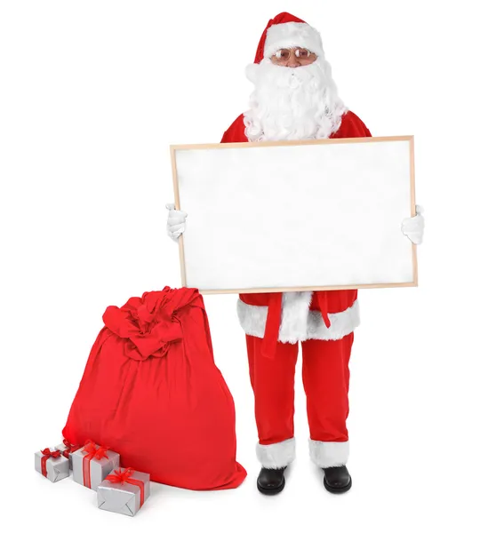 Santa claus and empty board — Stock Photo, Image