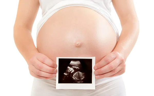 Gravid kvinna med ultraljud bild — Stockfoto