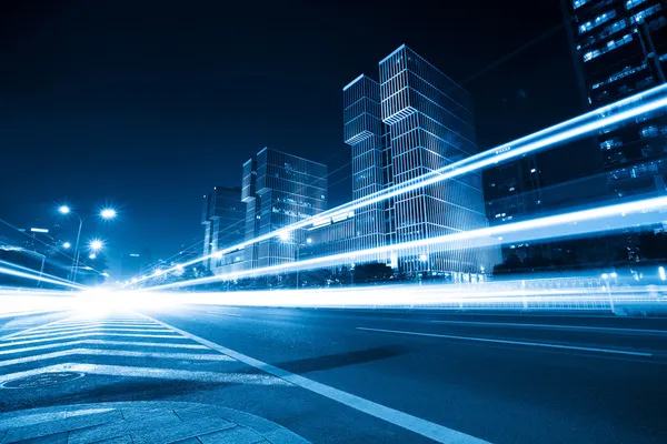 Light trails on the road with blue tone — Stock Photo, Image