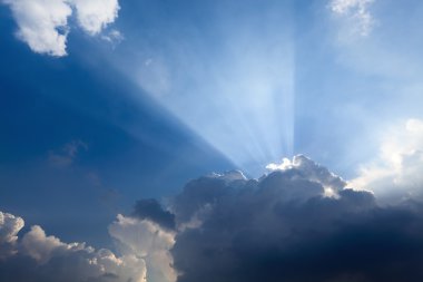 Sun rays behind the cloud clipart