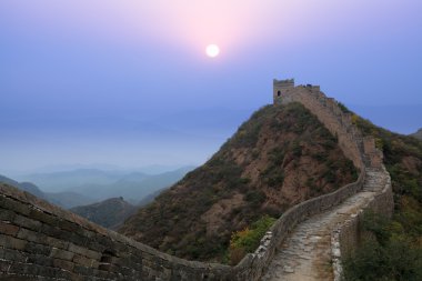 The great wall of china at sunrise clipart