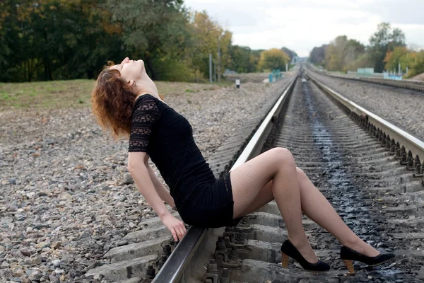 Girl walking near rails — Stock Photo, Image
