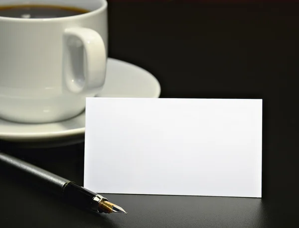 Business card and a coffee cup — Stock Photo, Image