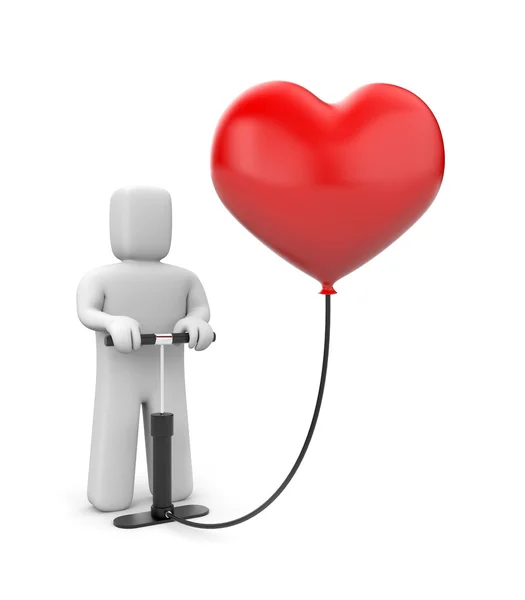 The person pumps up heart balloon — Stock Photo, Image