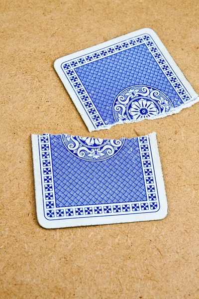 Broken into two playing card deck of old — Stock Photo, Image