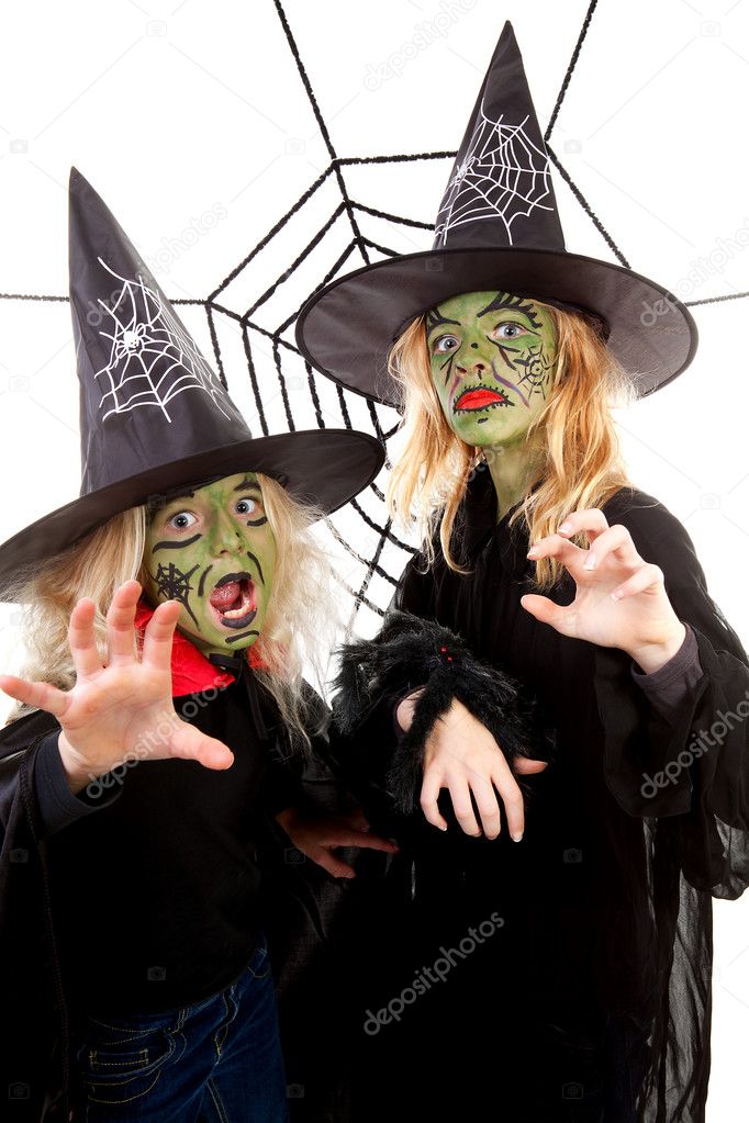 Two scary little green witches for Halloween