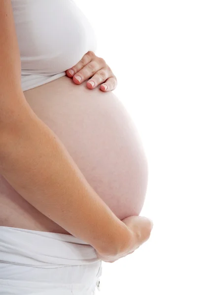 Segurando barriga grávida — Fotografia de Stock