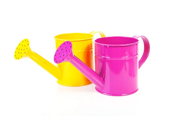 Two colorful watering cans — Zdjęcie stockowe
